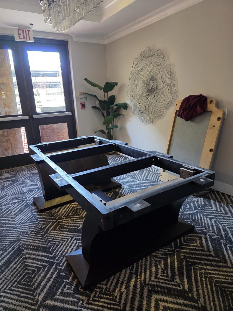 Expert installer in Boulder assembling furniture and ensuring precise setup