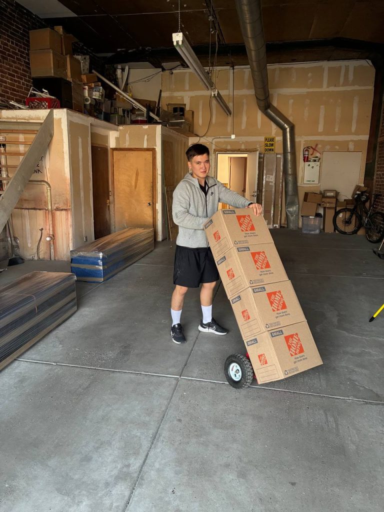 Assembly and installation team from PackPalTeam setting up home fixtures in San Antonio