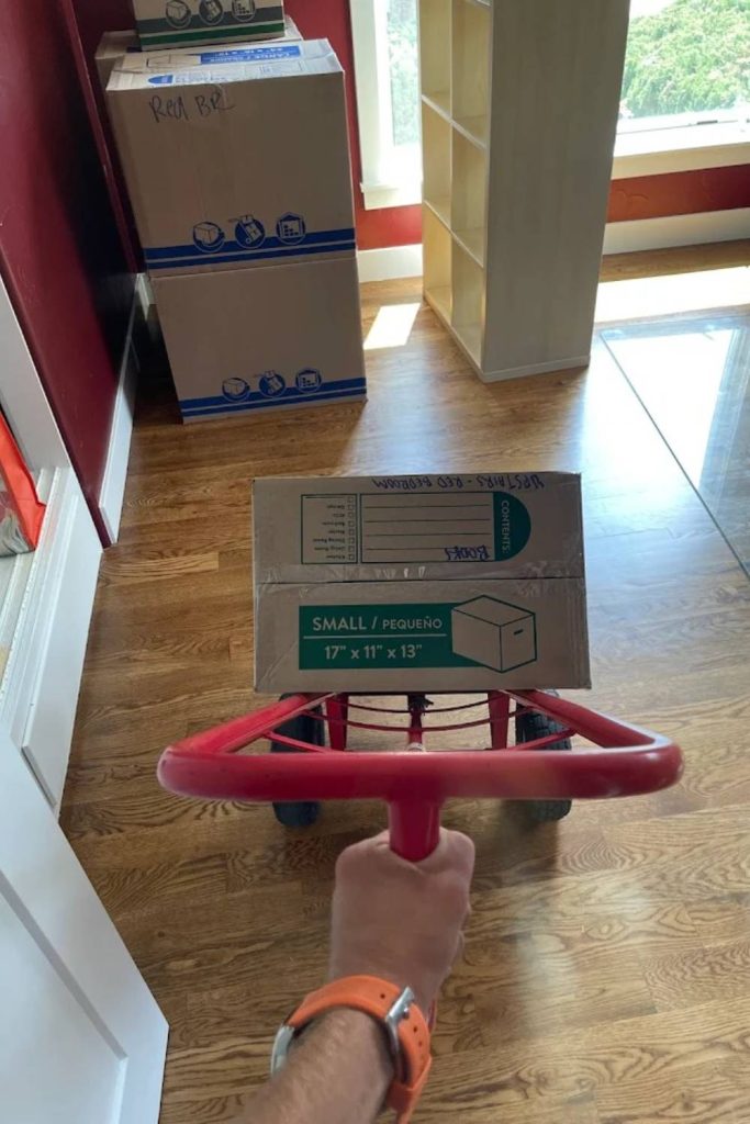 Experienced movers carefully packing a piano for a long distance move out of Colorado Springs